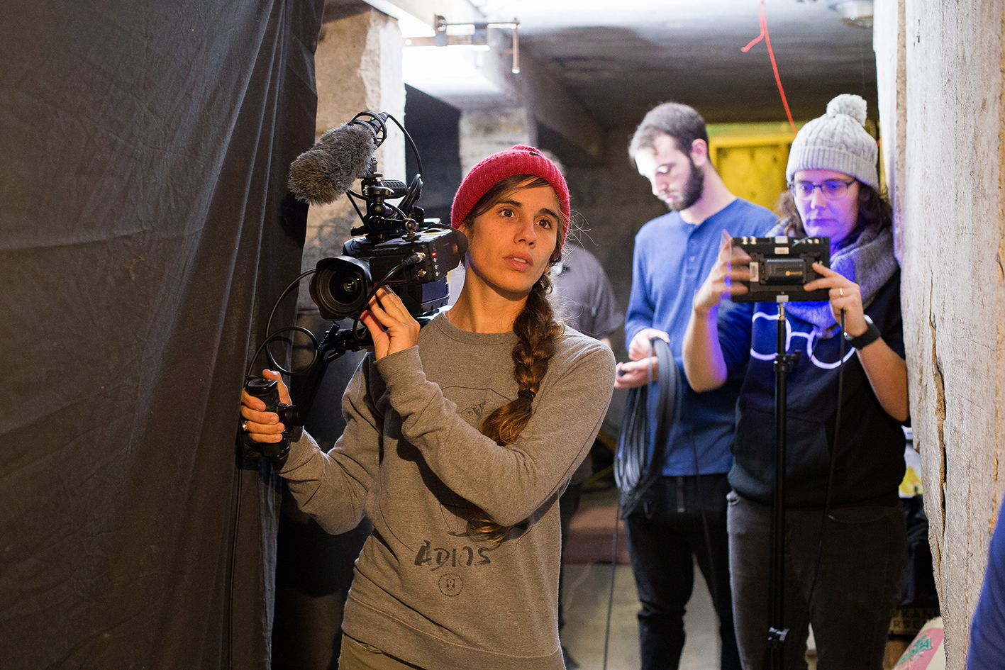 Director of photography, Sara Guix and Wintec Alumni David Tharratt (camera assist) prepare to reposition the camera in Blink.
