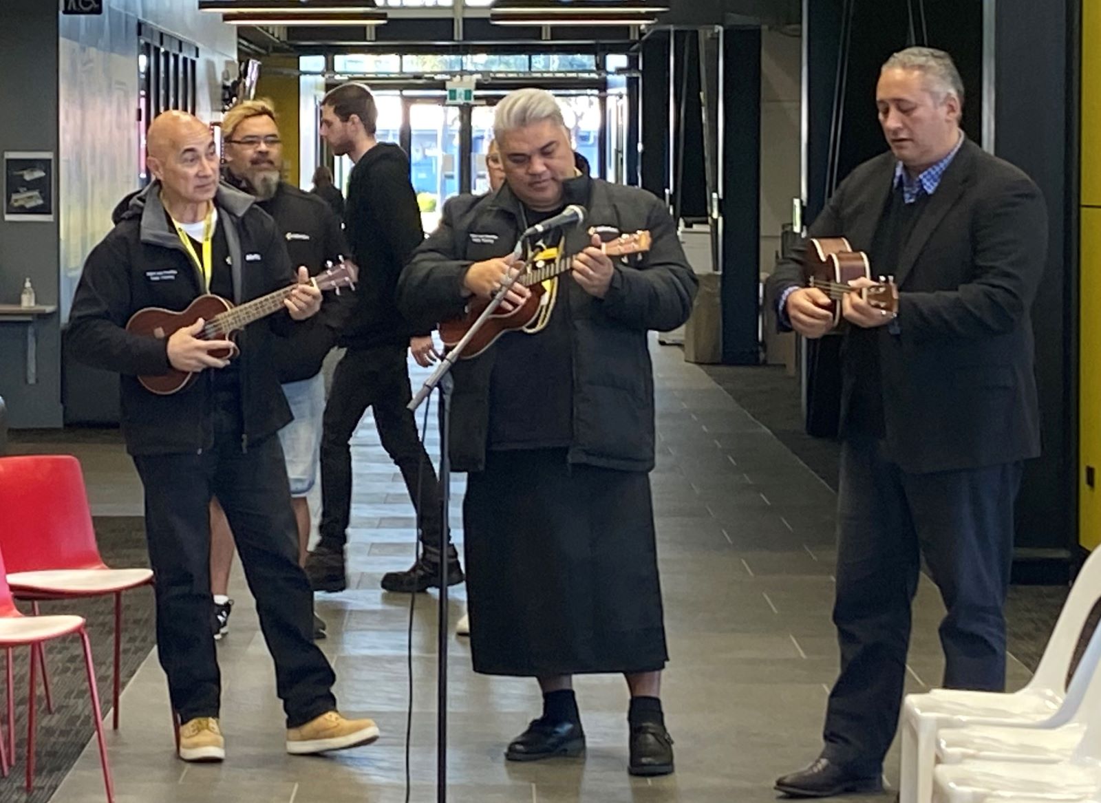 Wintec staff playing ukulele at the Rotokauri campus pōwhiri to welcome students