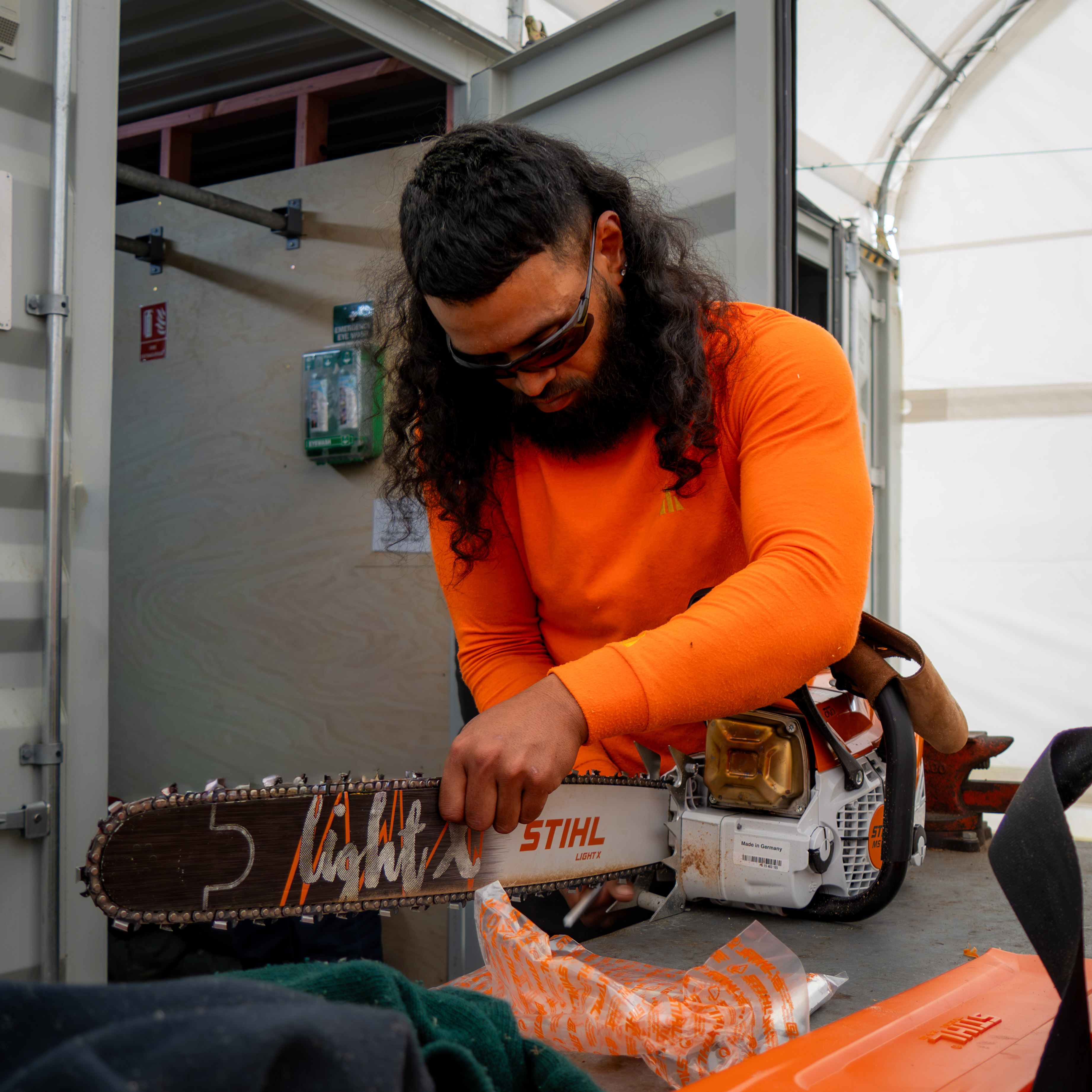 Wintec arb student maintaining new STIHL saw
